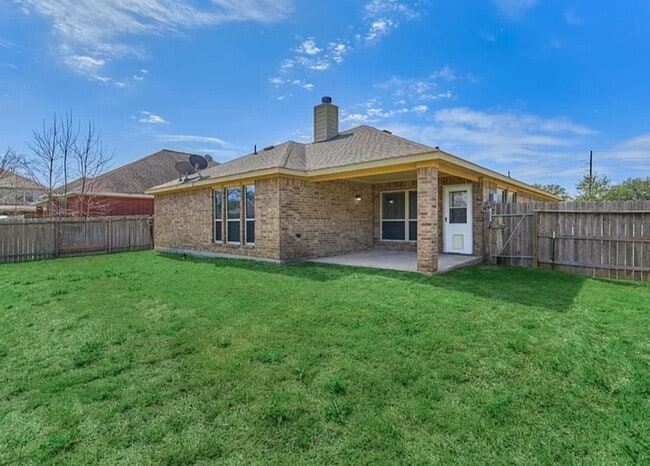 Fully Fenced Backyard - 13210 Raintree Dr