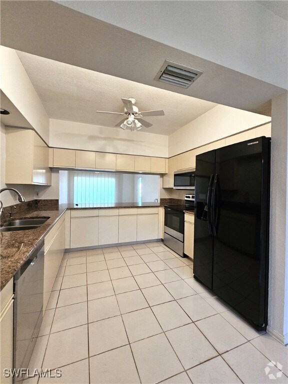 Building Photo - 6025 Chardonnay Ln Unit 102 Rental