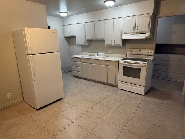 Photo - Beautiful town home with deep 2 car garage and a large covered patio