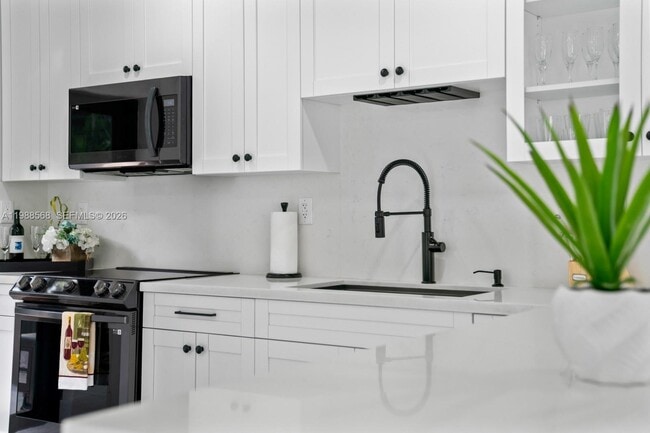 Photo - Northeast 137th Terrace, North Miami, FL 33181 - 4 BR 2 BA single-family home