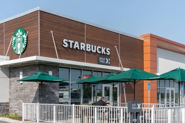 Starbucks feet from Slade Farm with patio seating—morning coffee in under three minutes. - Slade Farm Residences