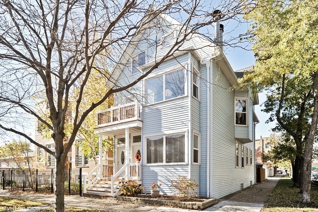 Building Photo - 4922 N Janssen Ave Unit 1 Rental