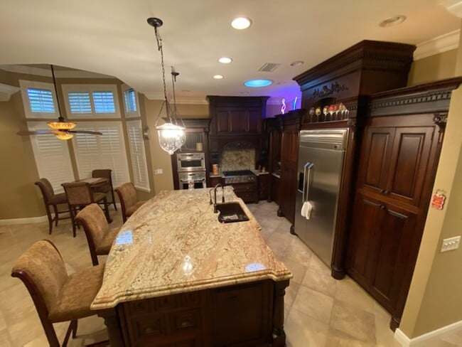 oversized kitchen island, granite countertop, gourmet kitchen - 213 Harmony Ln