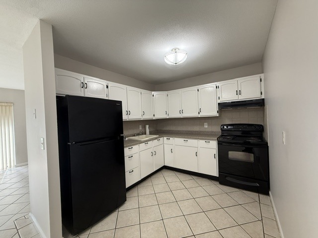 New door handles on newly painted cabinets - 1274 E Main St Unit AtriumA10