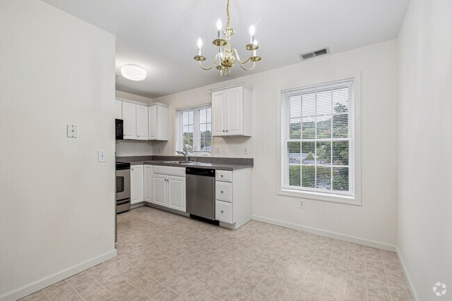 1BR, 1.5BA -714SF - Eat-In-Kitchen - Orchard Place
