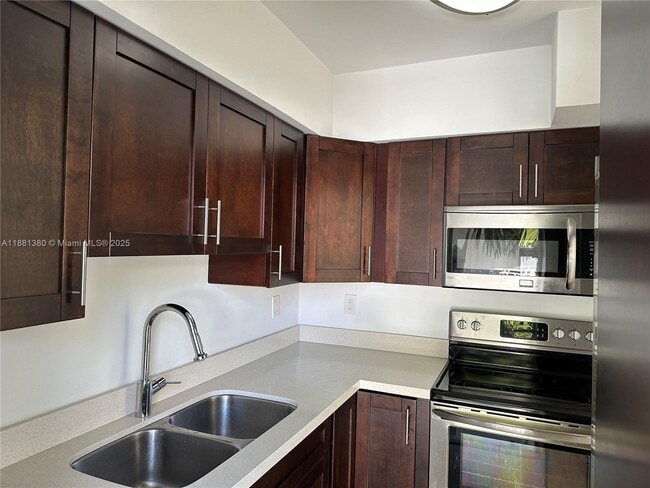 Building Photo - 10001 W Bay Harbor Dr Unit 407 Rental