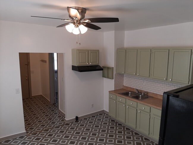 Unit Has A Black Electric Stove - 1745 S 8th St