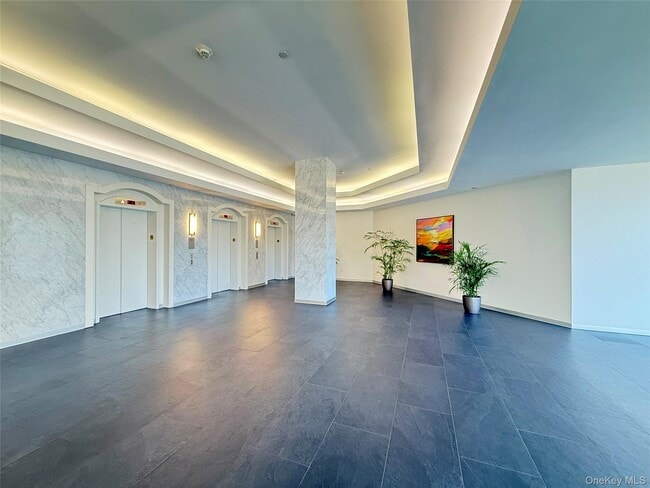 Building Photo - 4 Martine Ave Unit 203