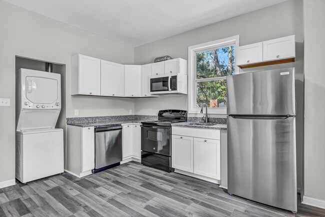 Brand new stainless steel appliances and W/D