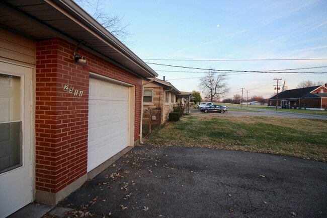 Photo - Adorable 3-brm brick ranch with lots of na...