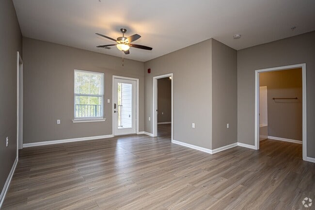 Photo - **Summer Leasing Promotion at Turtle Creek** Unit 1-205