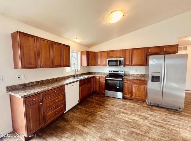 Photo - Fantastic 1400 sqft Ranch style home with 3 Large bedrooms, 2 bath, 2 car garage with LVP through...