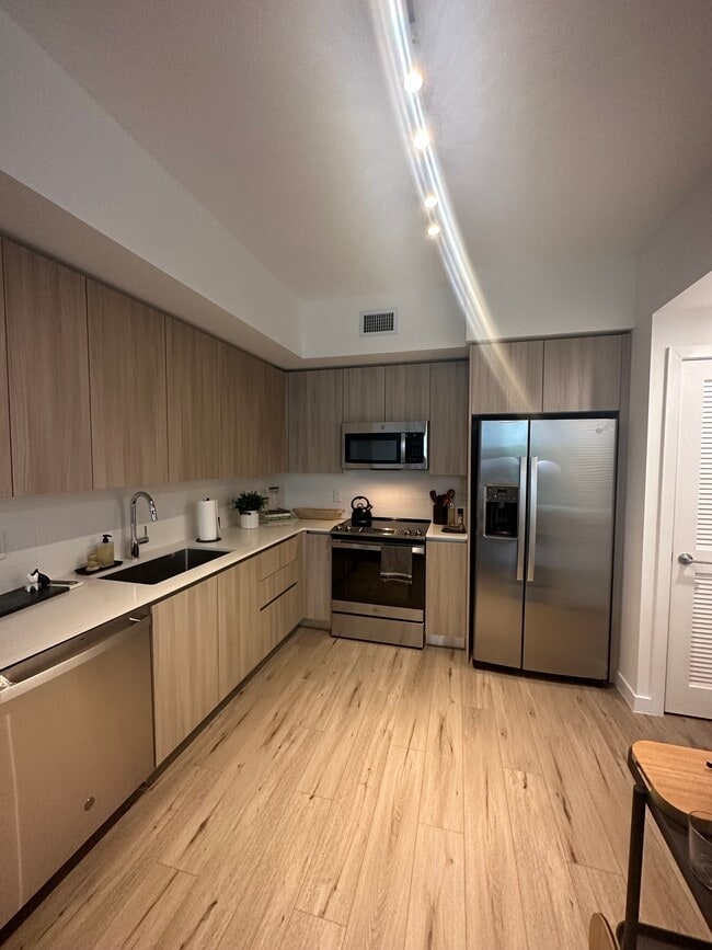 Building Photo - 7568 W 4th Ct Unit A4 Rental