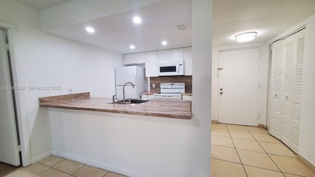 Photo - 8160 Geneva Ct Unit 104