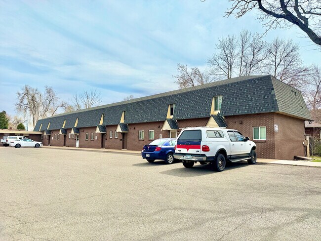 Charming townhouse complex with modern architectural design, ample parking, and serene surroundings. - 3650 Upham