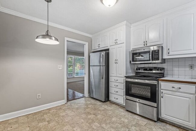 Photo - McLeansville - Minutes from Elon & Greensboro! Brick Duplex on a few Acres, Den, SS Appliances, F...