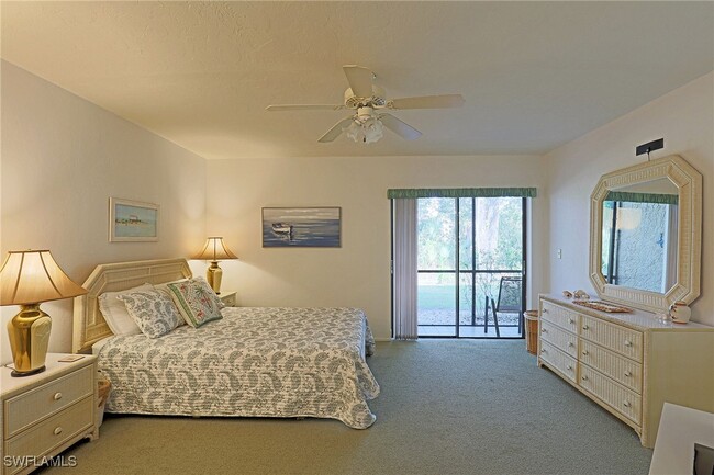 Building Photo - 9627 Eaton Gardens Ln Unit 104