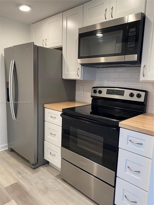 Building Photo - 801 SW 133rd Terrace Unit 310K Rental