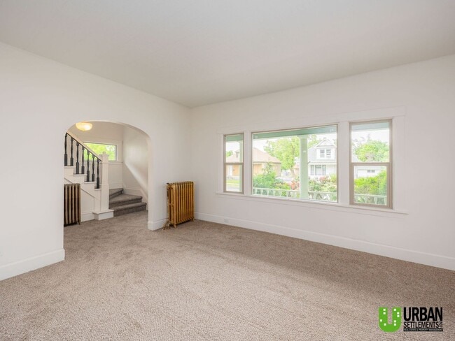 Photo - Spacious 4-Bedroom Home with 2-Car Garage, Basement Storage & Flexible Living Space in North Spokane