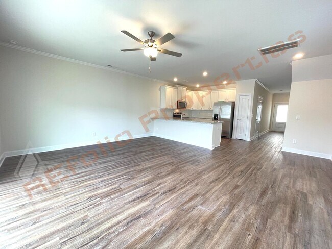 Photo - Amazing 3 Bedroom 1-Car Garage End Unit To...