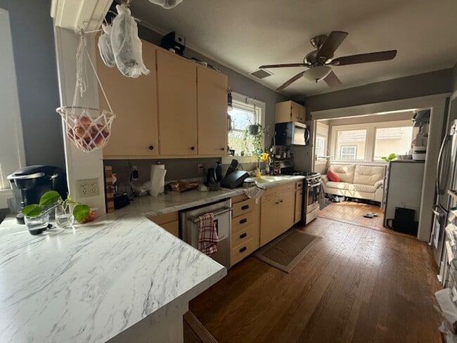 Photo - Stylish Hardwood Floors | Fenced Yard | 2-Car Garage | Prime Location