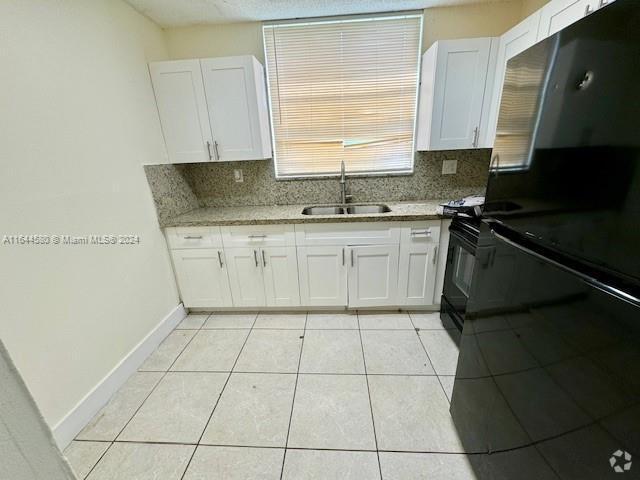 Building Photo - 1752 NW 55th Ave Unit 103 Rental