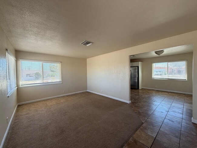 Photo - 3 Bedroom 2 Bathroom House with Central A/C , 2 Car Garage and Beautiful Backyard with Covered Patio