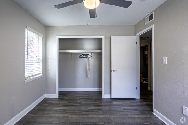 Spacious bedrooms with ceiling fans