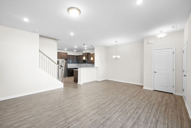 Building Photo - Luxury 3BR Townhome Near Costco & 540 – Built in 2023!