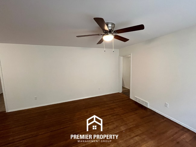 Photo - Spacious 3BR/2BA Home with Den & Living Room | Brick Fireplace & Large Yard
