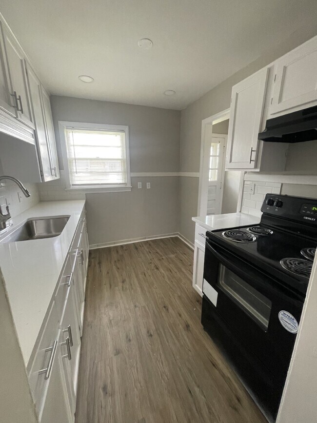 Photo - Updated 2 bedroom, 1 bathroom duplex with washer/dryer hookups and off street parking