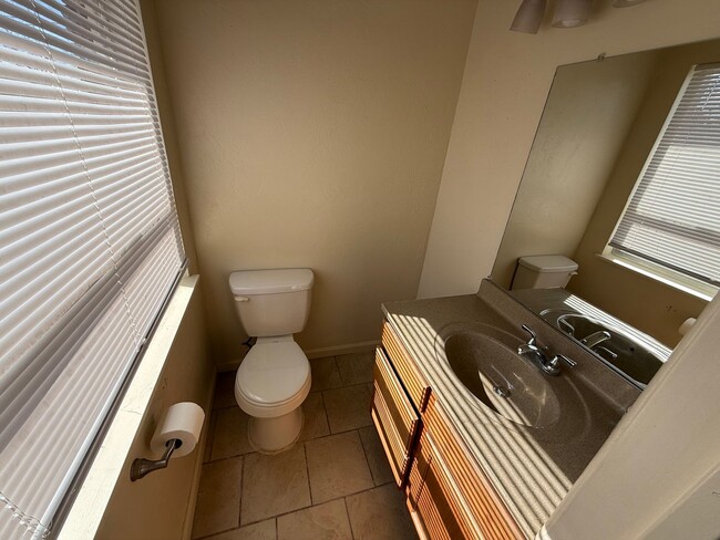 Photo - 4 bed , 1.5 bath , inside laundry, fenced yard, ceramic flooring throughout!