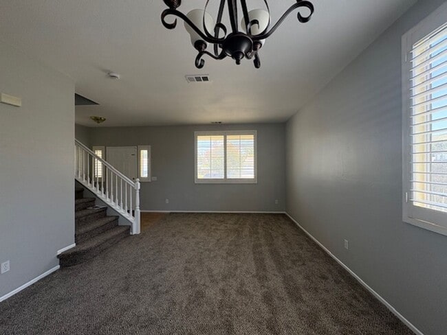 Building Photo - 4 Bedroom with NEW Carpet & Paint Rental