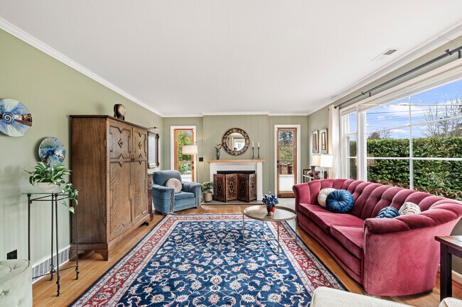Comfortable gathering space with abundant natural light. - 11639 1st Ave NW Unit 116391stAve