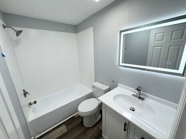 Photo - GORGEOUS REMODELED 3BR/2BA Zephyrhills Home with HUGE SCREENED IN PORCH and Shed