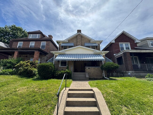 Building Photo - 7132 Michigan St Unit 1