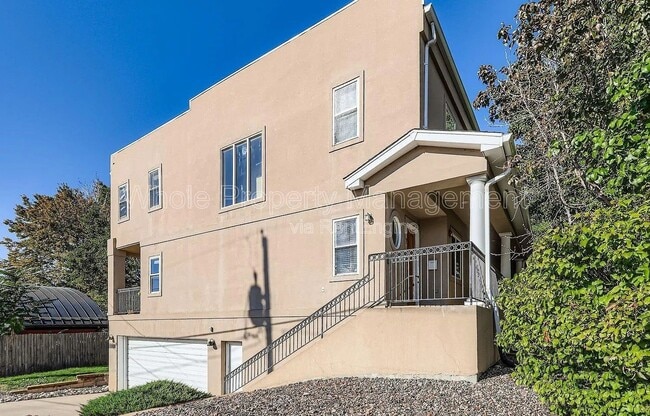 Building Photo - 3030 Wyandot St Unit 7