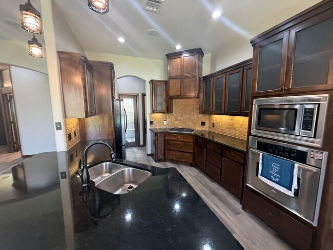 Photo - 3 bed plus office, Neighborhood amenities include a neighborhood pond, Pool and playground!