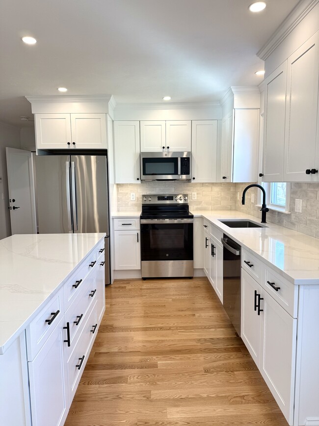 Kitchen: Brand New Stainless Steel Appliances, Quartz Countertops - 34 Saint Joseph Ave Apartments