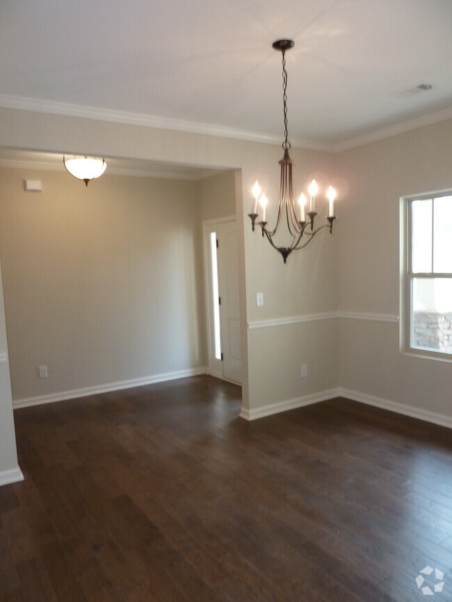 Building Photo - Inviting 4BR Ranch with Bonus Room in a Sw... Rental