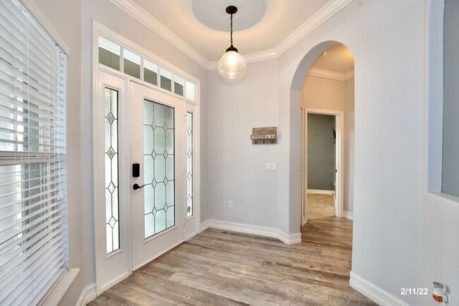 Photo - Luxurious 4/3 Waterfront Home with an In-ground Spa, an In-law Suite and a 2 Car Garage in the Hi...