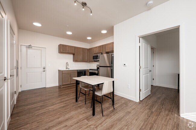 2BR, 2BA - 730SF - Dining Area - Escher Apartments