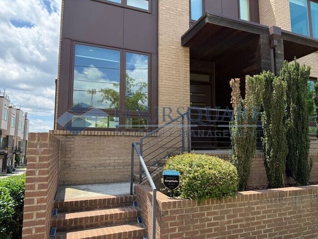 Photo - Beautiful 3-Bed / 3.5-Bath End-Unit Townhome with Rooftop Patio, Skyline Views & Climate-Control...
