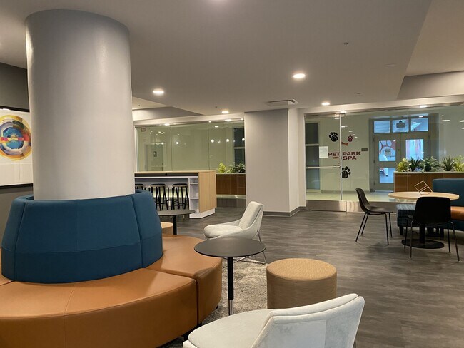 Modern coworking spaces and resident lounge areas at Liberty Lofts.