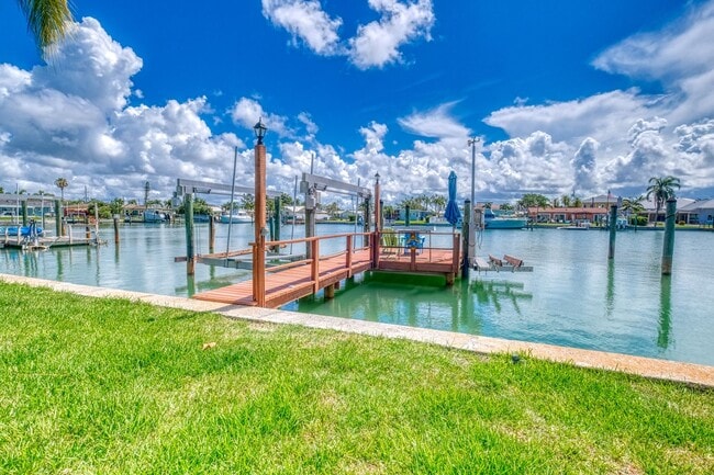Photo - Treasure Island Three Bedroom, Two Bath Furnished Single Family Home on the water.