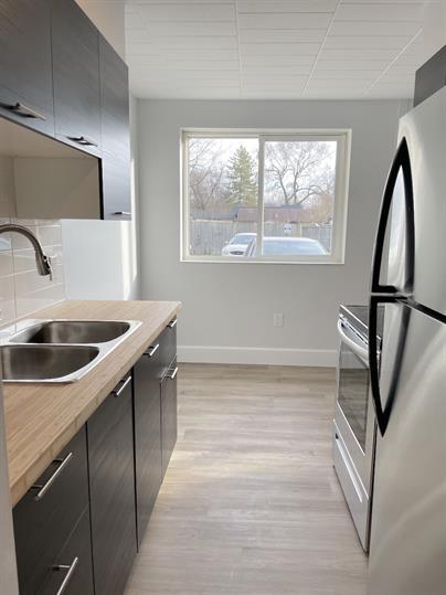 Photo - 471 Tecumseh Rd W Unit 107