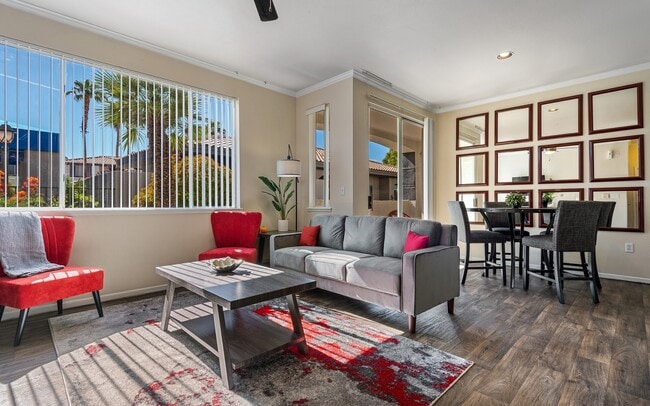 Living and dining share one long room with the window at the near end.