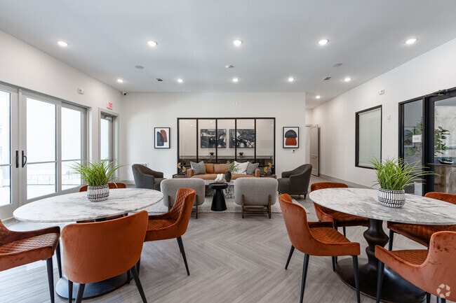 Sala comunitaria amueblada con cocina de catering