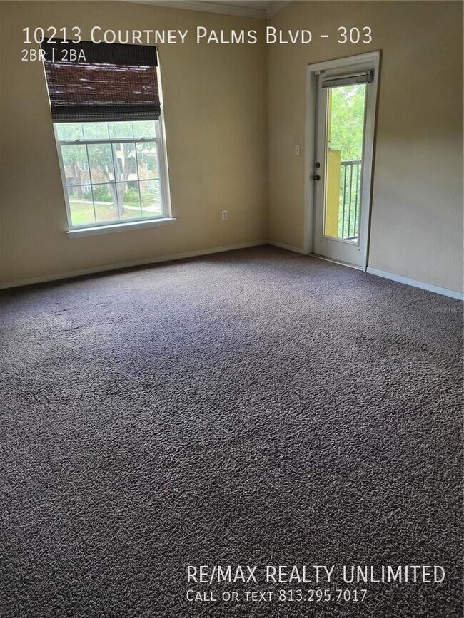 Photo - 10213 Courtney Palms Blvd Unit 303