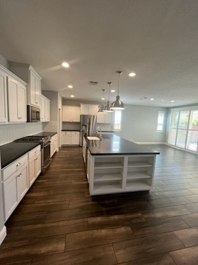 Photo - Solar powered open concept home located in the newer Brighton Landing subdivision!